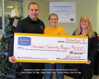 2013 Receiving Donation from Meridian Credit Union to HCP