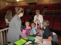 Linda  and Dianne helping out